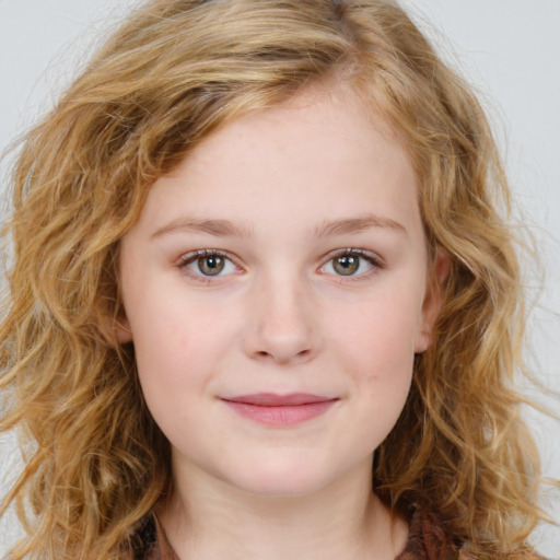 Joyful white child female with long  brown hair and brown eyes