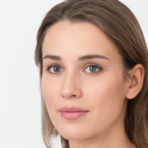 Neutral white young-adult female with long  brown hair and grey eyes