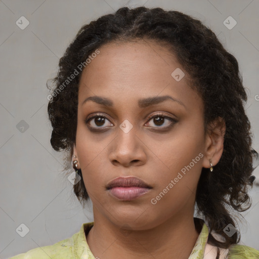 Neutral black young-adult female with medium  brown hair and brown eyes