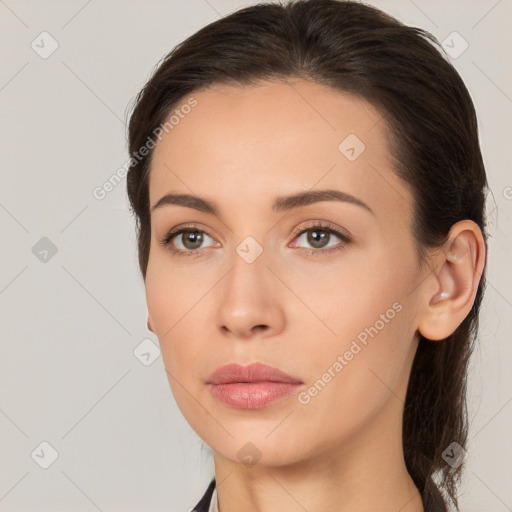 Neutral white young-adult female with long  brown hair and brown eyes