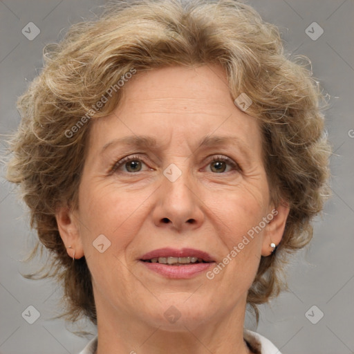 Joyful white middle-aged female with medium  brown hair and brown eyes