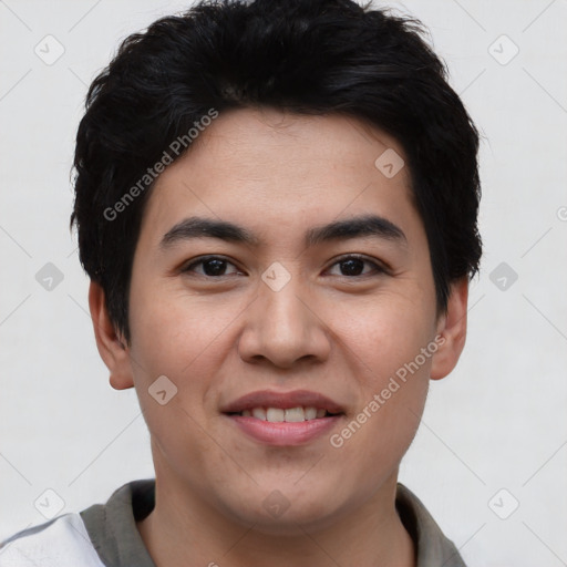 Joyful asian young-adult male with short  black hair and brown eyes