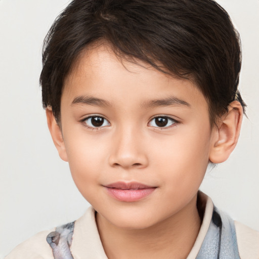 Joyful white child female with short  brown hair and brown eyes