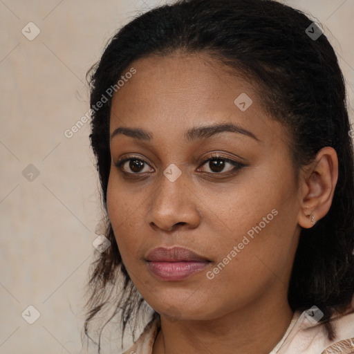 Joyful black young-adult female with medium  brown hair and brown eyes