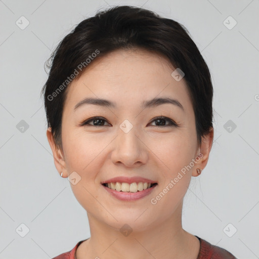 Joyful asian young-adult female with short  brown hair and brown eyes