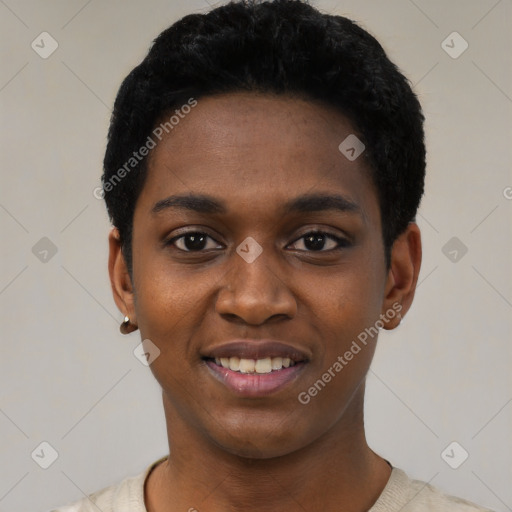 Joyful black young-adult female with short  black hair and brown eyes