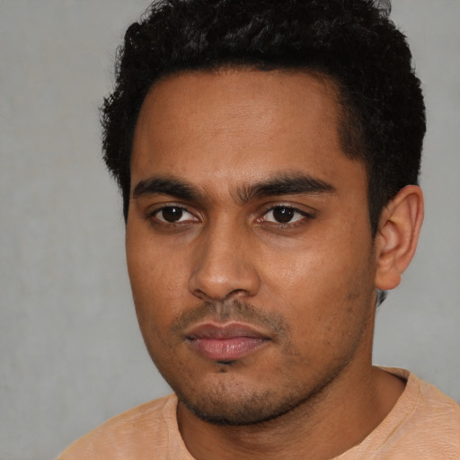 Neutral latino young-adult male with short  black hair and brown eyes