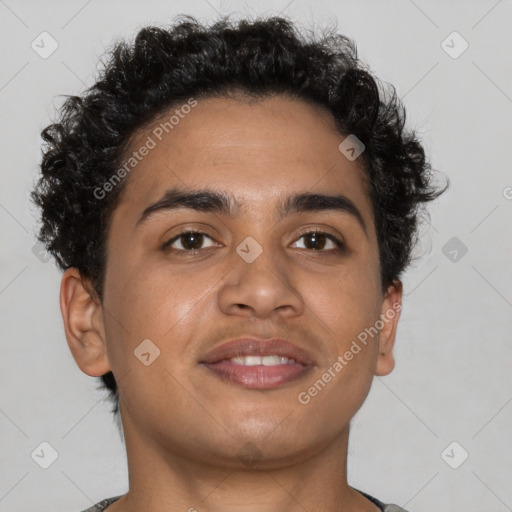 Joyful latino young-adult male with short  brown hair and brown eyes