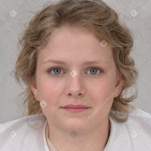 Joyful white young-adult female with medium  brown hair and blue eyes