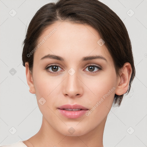 Neutral white young-adult female with short  brown hair and brown eyes