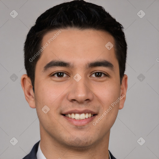 Joyful white young-adult male with short  black hair and brown eyes