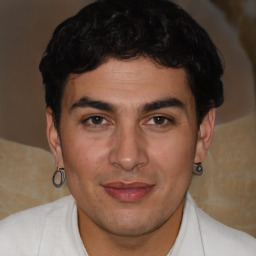 Joyful latino young-adult male with short  brown hair and brown eyes