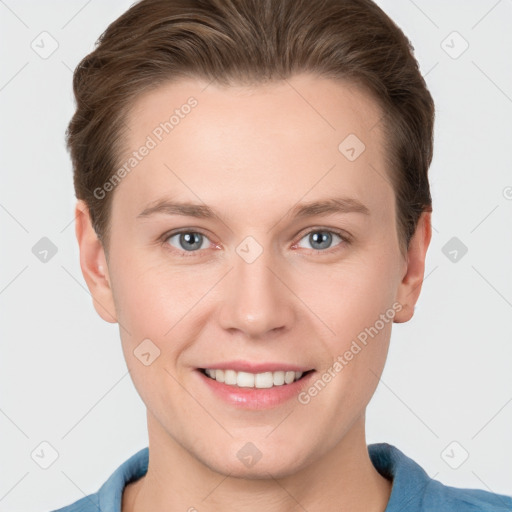 Joyful white young-adult female with short  brown hair and grey eyes