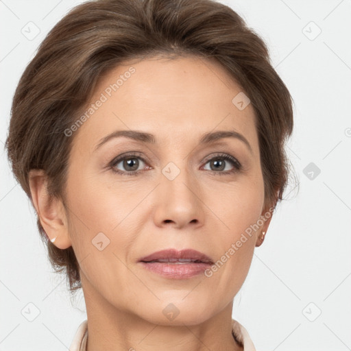 Joyful white adult female with short  brown hair and brown eyes