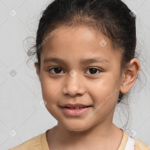 Joyful white child female with short  brown hair and brown eyes