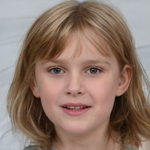 Joyful white child female with medium  brown hair and grey eyes