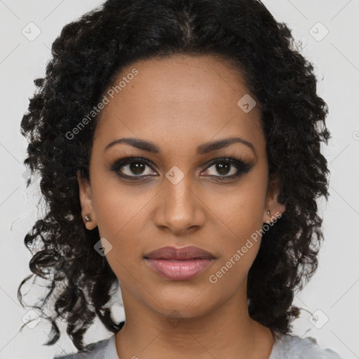 Joyful black young-adult female with long  brown hair and brown eyes