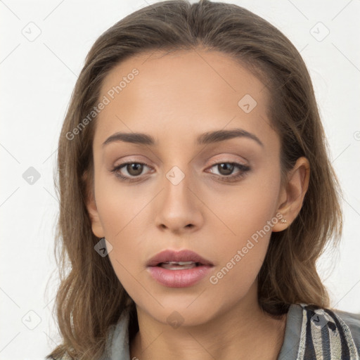 Neutral white young-adult female with long  brown hair and brown eyes