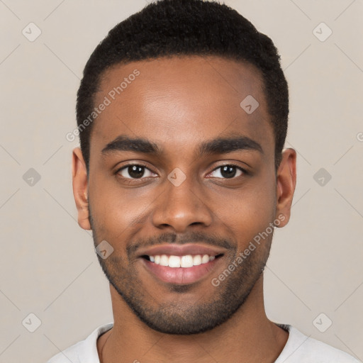 Joyful black young-adult male with short  brown hair and brown eyes