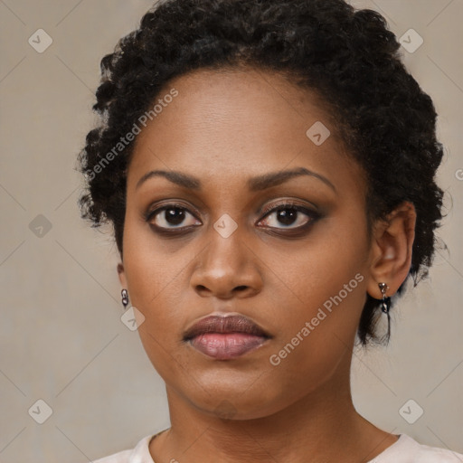 Neutral black young-adult female with short  brown hair and brown eyes