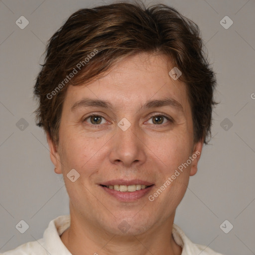 Joyful white adult female with short  brown hair and brown eyes