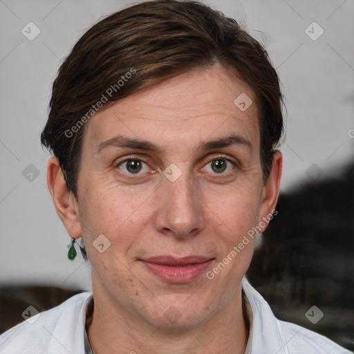 Joyful white adult female with short  brown hair and brown eyes