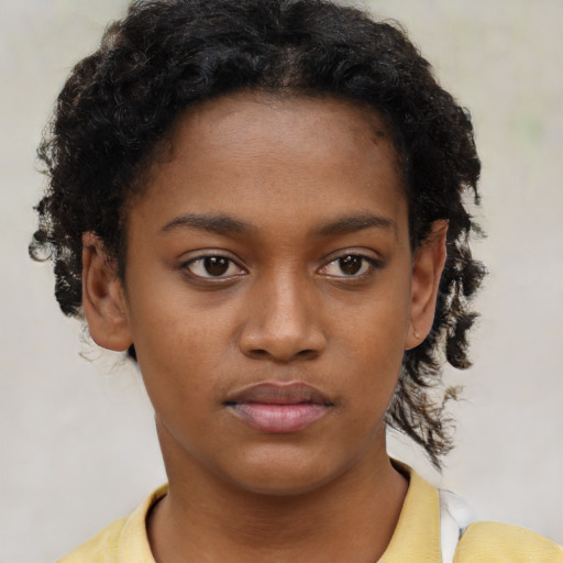 Neutral black young-adult female with short  black hair and brown eyes