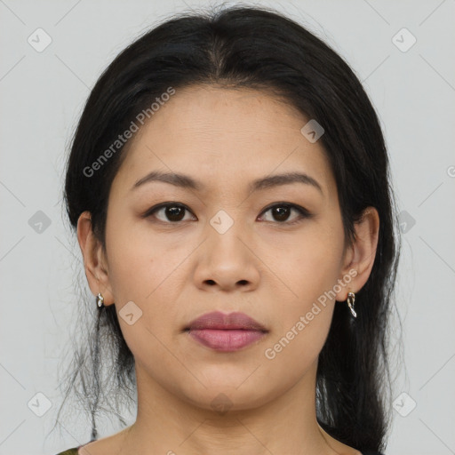 Joyful asian young-adult female with long  brown hair and brown eyes