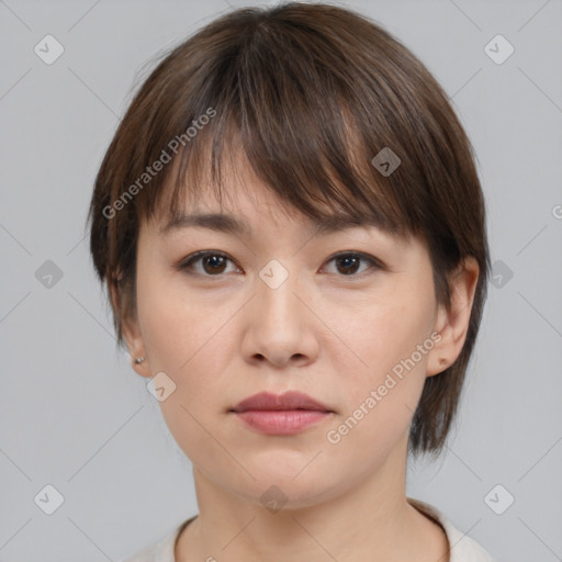 Neutral white young-adult female with medium  brown hair and brown eyes