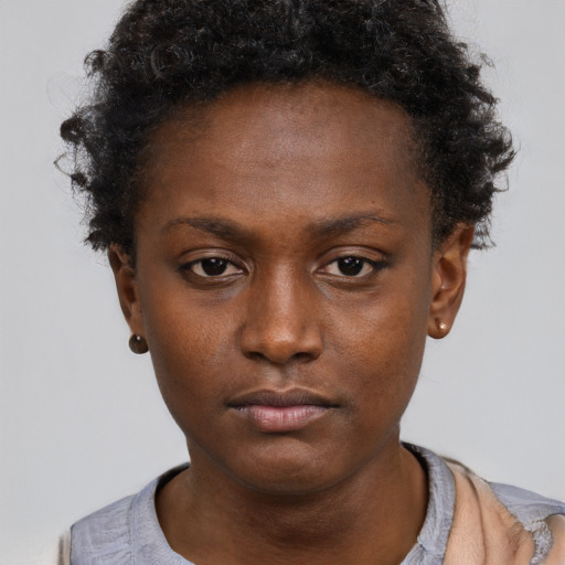 Neutral black young-adult female with short  brown hair and brown eyes