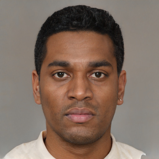 Neutral black young-adult male with short  black hair and brown eyes