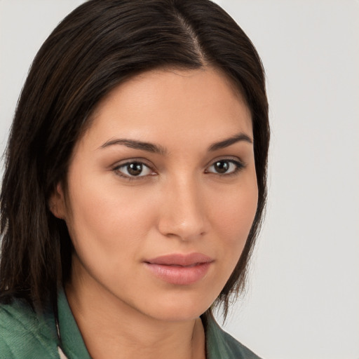 Neutral white young-adult female with medium  brown hair and brown eyes