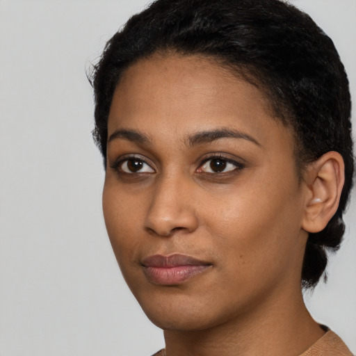Neutral latino young-adult female with short  black hair and brown eyes