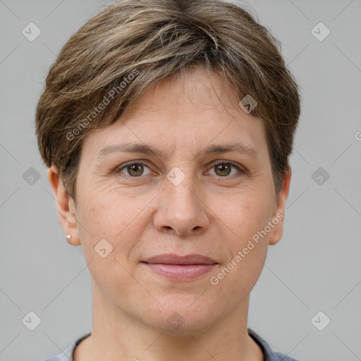 Joyful white adult female with short  brown hair and grey eyes