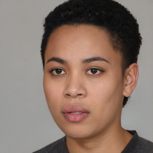 Neutral black young-adult female with short  black hair and brown eyes