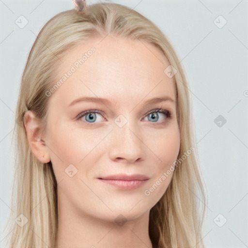 Joyful white young-adult female with long  brown hair and blue eyes