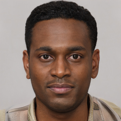 Neutral black young-adult male with short  brown hair and brown eyes