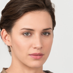 Neutral white young-adult female with short  brown hair and brown eyes