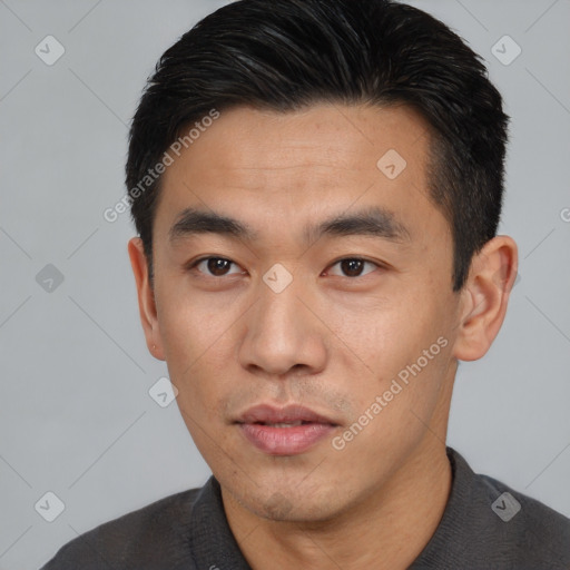 Neutral asian young-adult male with short  black hair and brown eyes