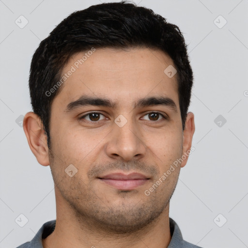 Joyful latino young-adult male with short  brown hair and brown eyes