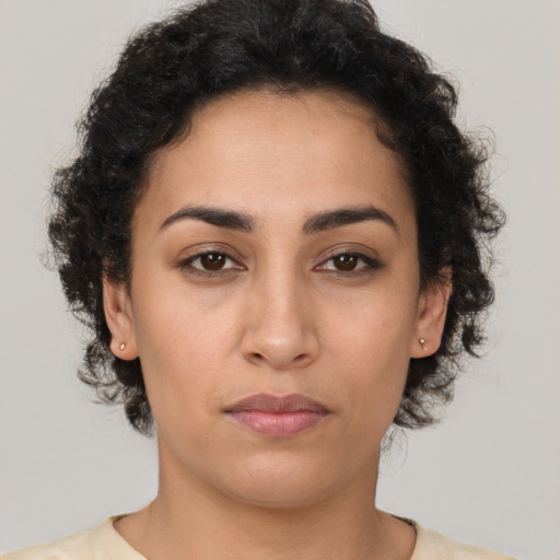 Neutral latino young-adult female with short  brown hair and brown eyes