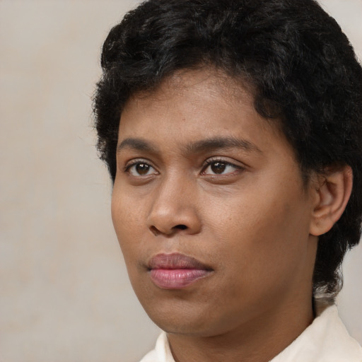 Neutral latino young-adult male with short  brown hair and brown eyes