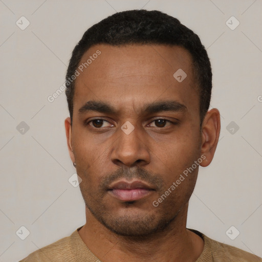 Neutral latino young-adult male with short  black hair and brown eyes