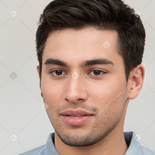 Neutral white young-adult male with short  brown hair and brown eyes