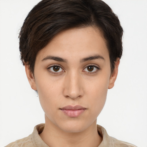 Neutral white young-adult female with short  brown hair and brown eyes