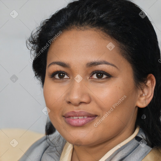 Joyful latino young-adult female with long  black hair and brown eyes