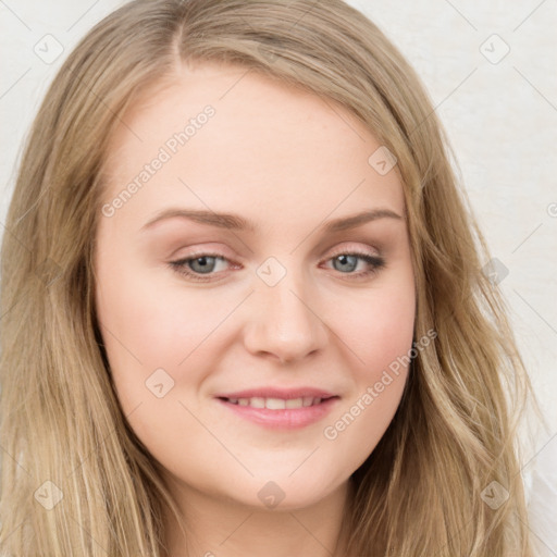 Joyful white young-adult female with long  brown hair and blue eyes