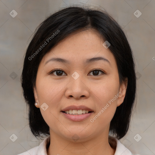 Joyful asian young-adult female with medium  brown hair and brown eyes