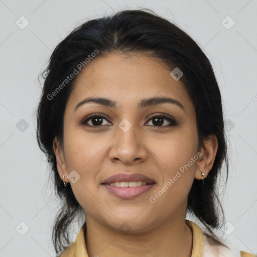 Joyful latino young-adult female with medium  brown hair and brown eyes