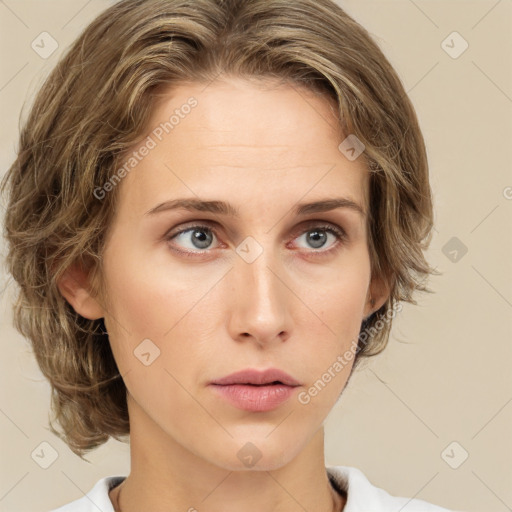 Neutral white young-adult female with medium  brown hair and green eyes